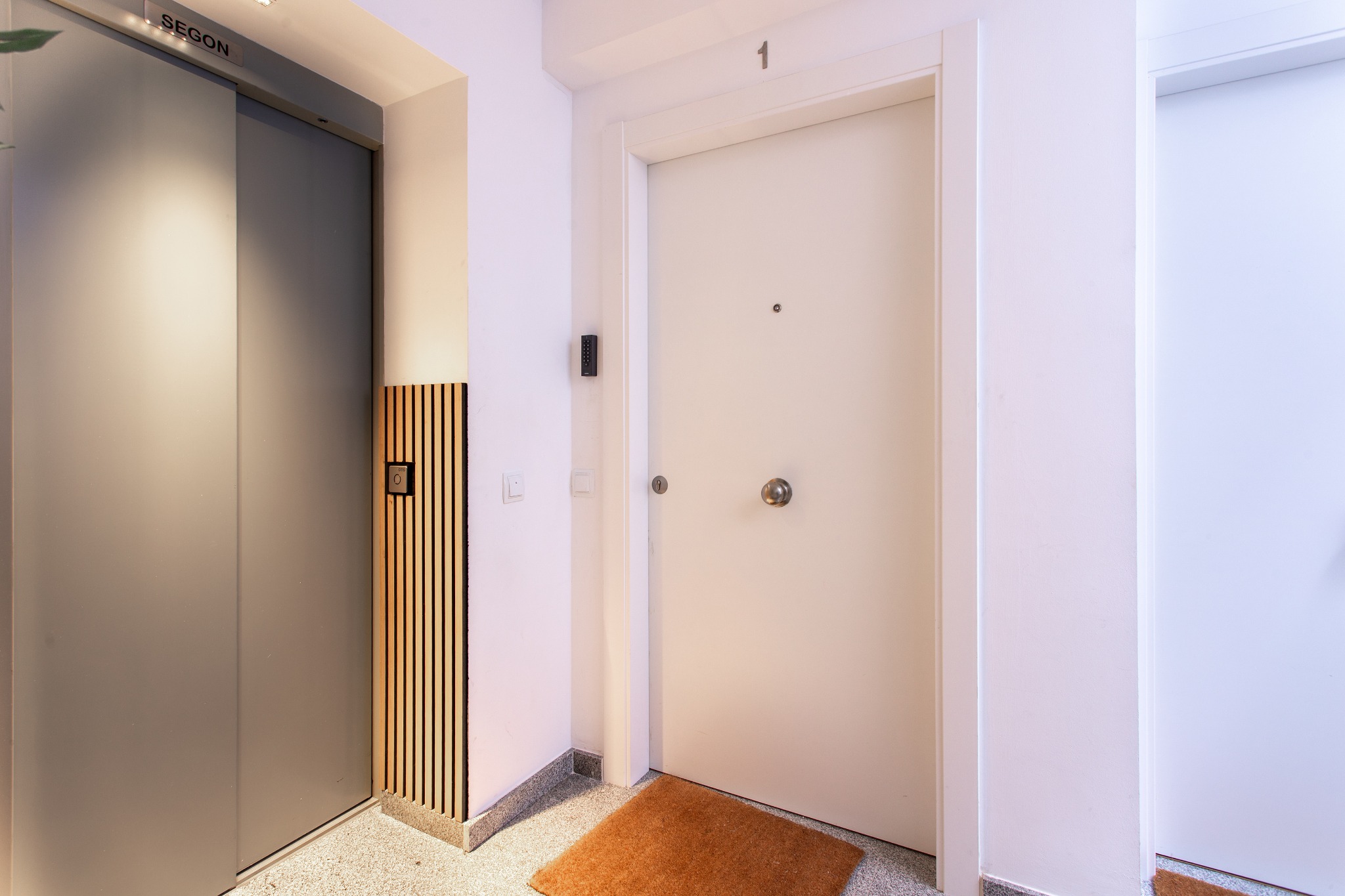 Apartment door and elevator access